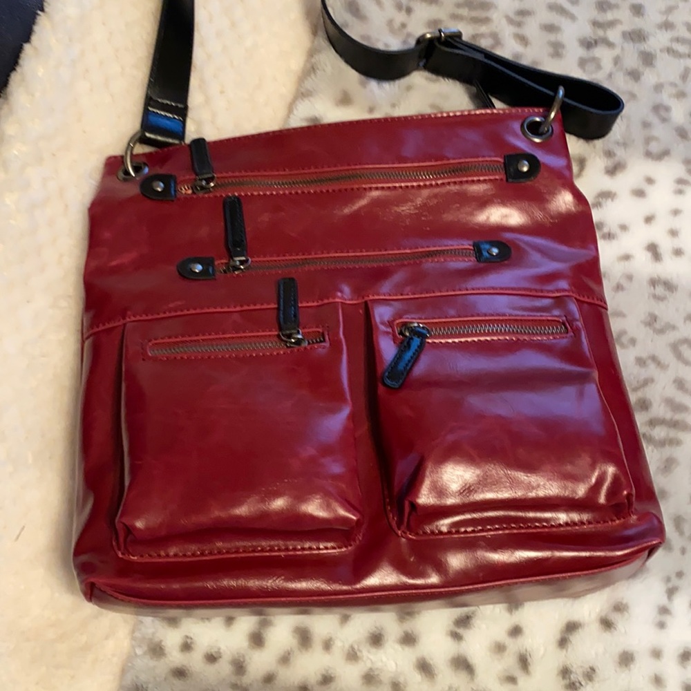 Shira Leah crossover purse. New. Never used. Wine color.